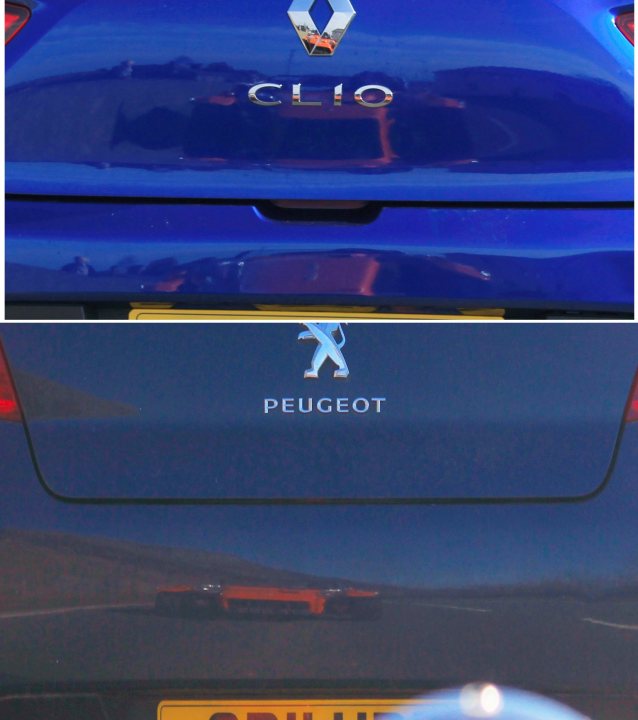 Not enough pictures on this forum - Page 70 - Caterham - PistonHeads - The image shows two vehicles in a parking lot. On the left, there is a blue car with a "Clo" logo on the back. To its right is a Peugeot car with a similar "Cloi" logo. Both cars are facing away from the viewer, and they appear to be of a similar model or brand. The setting suggests an outdoor environment, possibly a dealership lot, given the presence of license plates and car-related details in the background.