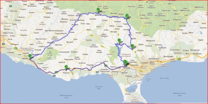 Hello from Cyprus! - Page 1 - Aston Martin - PistonHeads - The image appears to be a map showcasing a specific trail or route. The route is illustrated in color, with a purple outline and several small green dots along its path. The map is primarily in shades of green and yellow, with the trail cutting through various landscapes. There are several labels on the map, likely indicating place names, points of interest, or route markers. The image is overlaid with red streaks that could represent the trail's DNA sequence or a similar concept.