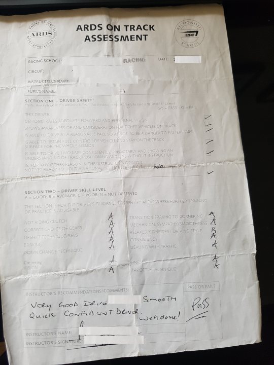 Booked my ARDS Test - Page 1 - UK Club Motorsport - PistonHeads - The image shows a scrap of paper with text and annotations. The text appears to be part of an assessment document titled "ARDS ON TRACK ASSESSMENT," with sections for information, food diaries, and a commentary by a teacher or educator. The paper has some marks and annotations, indicating feedback or corrections have been made. A handwritten note in the lower part of the paper states "Quick Conf.,Is done," and another mark reads "Pass." This suggests a review or feedback process for the assessment.