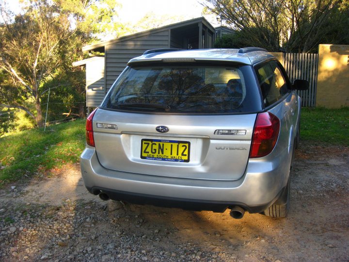 A car is parked on the side of the road - Pistonheads