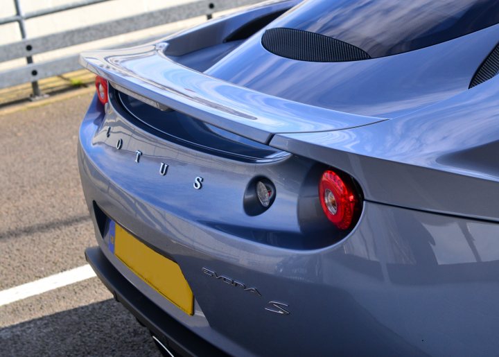 Robert Barrie Track Day 24th Feb Goodwood - photos - Page 1 - South Coast - PistonHeads - This is a detailed image of the back of a car. The vehicle appears to be a luxury or sports vehicle, featuring a sleek design with a matte grey color. The taillights are prominently displayed, with red brake lights. There is a distinctive emblem with the text "Tuttor" below the rear window, which could be the brand of the car.