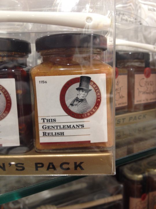 Juvenile things that make you snigger. - Page 265 - The Lounge - PistonHeads - This image shows a display of three jars with labels featuring a classic gentleman's head and a ring around the top of each jar. The most prominent jar in the foreground has a red seal on it, suggesting it might be the featured or featured item. The jars appear to be a product line, possibly indicating a series of relishes or condiments designed by the gentleman on the label. The packaging is such that the contents of the jars are not directly visible, but the lids suggest a typical glass jar presentation, which could imply a quality or preserved food product. The price of "THIS GENTLEMAN'S RELISH" is included on the label but not specified in the given description.