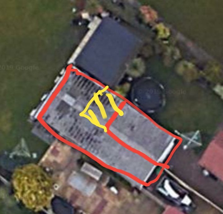 Property boundary help - Page 1 - Speed, Plod & the Law - PistonHeads - The image is an aerial view of a residential property, specifically a house that appears to be undergoing renovations or construction. Yellow lines are superimposed on the image, marking out the areas of interest. The house itself has a flat roof and there's some visible work in progress, including what looks like new windows or doors being installed. The surrounding area includes a lawn and a driveway leading to the house. There is no text present in the image.