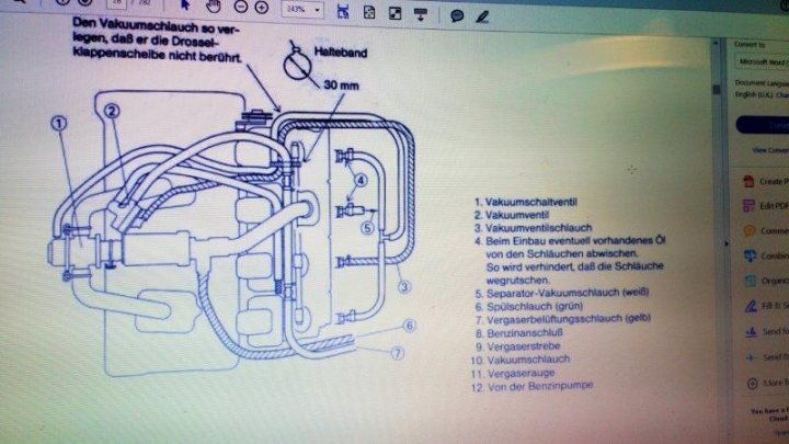 93 Zxr750 vacuum lines question - Page 1 - Biker Banter - PistonHeads - The image shows a computer screen displaying a technical drawing of a three-phase industrial electrical terminal or block, which appears to be part of a larger electrical apparatus system or diagram. The drawing includes various component representations, such as screw terminals and pathways for electric connections. The screen is blurred due to the focus on the drawing, suggesting that it is not in direct focus. The text on the screen is in German, indicating that this is likely designed for a German-speaking audience, perhaps for documentation purposes. The design includes measurements going down, indicating the possible scale of the drawings or the importance of size in the assembly or design of the electrical system.