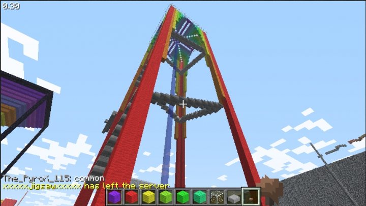 Rainbowfalljpg - The image depicts a vibrant scene from the blocky world of "Minecraft," a popular game known for its pixelated graphics. A prominent feature of the image is a colorful, rainbow-striped sky scraper, constructed meticulously in blocks. The rear side of each skyscraper block showcases a unique writing pattern, adding to the game's artistic style. The gray background is dotted with a few pink and white rectangles, perhaps representing other elements or buildings in the game. The bottom right corner of the image features the familiar green-and-yellow blocks of the game, indicating that the character or player is controlling the view from within the game. The spectators appear to be focused on the towering skyscraper, suggesting a sense of scale and grandeur in the game's structures.