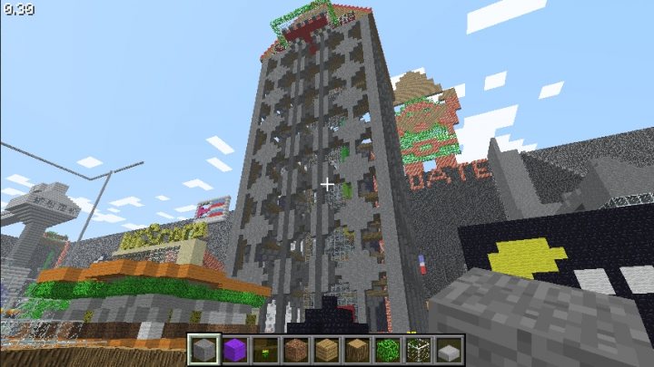 Turmhausjpg - The image captures a vibrant scene from a city built in Minecraft. The cityscape is filled with various blocky structures adorned with bright colors. The most prominent feature is a tall tower, possibly a skyscraper, located in the middle. It has banners hanging from a platform at the top, one of which reads "date". The city is bustling with different types of buildings, including a store named "best bricks", a restaurant with a sign that reads "best bread", and a clock tower displaying the time as 9:28. The sky overhead is a clear blue, suggesting a sunny day.