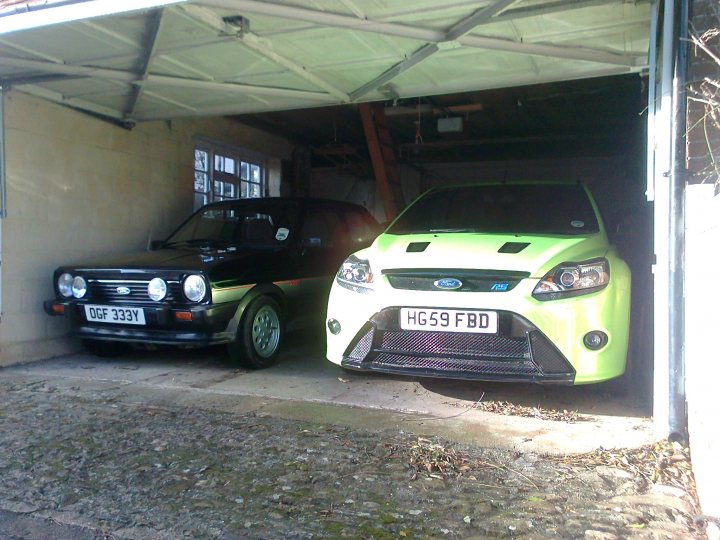 A car is parked next to a parking meter - Pistonheads