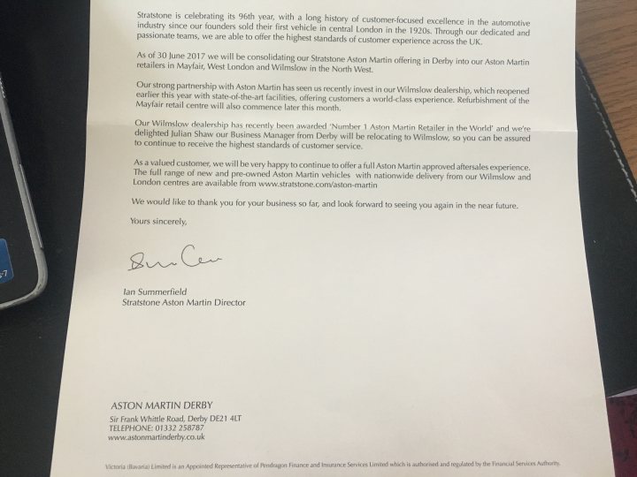 RIP Stratstone Aston Martin Derby - Page 1 - Aston Martin - PistonHeads - The image showcases a formal letter on a piece of paper. The document is neatly typewritten and signed by a Martin Wilson, hinting at the possibility of a business or professional context. The text is clear and uses a formal tone, potentially expressing an event of significance or celebration. The letter details an event related to London, William Eleven, and Edenware, referring to "The latest Aston Martin DBS Superleggera". Signed off with a professional Martin Wilson signature, the document conveys a message that seems to be of importance to the recipients.
