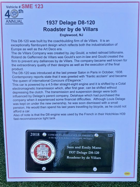 The Porsche's Big 70th Anniversary adventure... - Page 2 - General Gassing - PistonHeads - The image is a photograph of a white plaque with a 40th Anniversary inscription displayed within a black square frame. The text contains detailed historical information about the Delage D8-120 Roadster by de Villars, which was built by coachbuilders Villars and Masse. The plaque notes the exceptional flamboyant design that reflected "half of Europe as well as the Art Deco era." It mentions that the vehicle was the last pre-retired production of their kind, concluding with a description of the 1937 car's features and the influence of Delage's parent company, DeHaymes Cie. on its design, especially within a financial difficulty context.