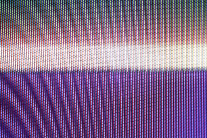 Pistonheads - The image is a close-up, showcasing horizontal lines that fill the frame. A gradient of colors is displayed across these lines, ranging from white and purple to blue and eventually red. The lines themselves appear to have a digital or pixelated quality to them. The image also shows subtle movement, as if the colors are flowing or melting into each other. The overall effect is quite mesmerizing and abstract, inviting the viewer to explore the interplay of colors and lines.