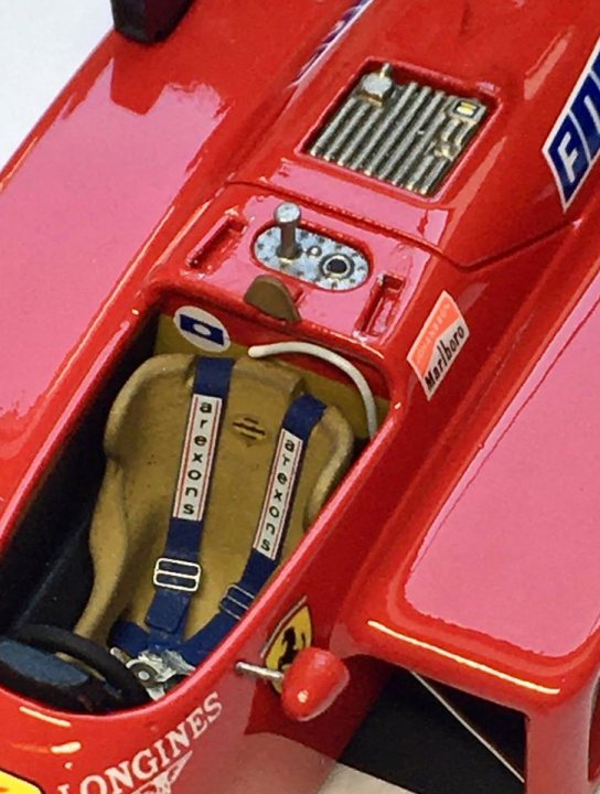A red suitcase is sitting on the floor - Pistonheads