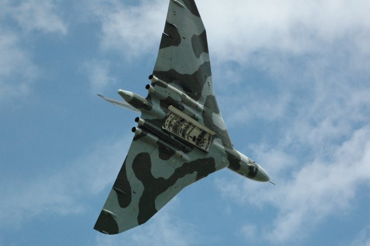 A fighter jet flying through a blue sky - Pistonheads