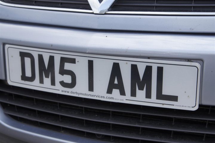 Plates Personal Naff Pistonheads - The image shows a close-up view of a vehicle's license plate. The license plate reads "DM51 AML." Below the license plate, there is text that says "www.derbymotorservices.com." The text and the license plate are explicitly visible and seem to be the central focus of the image. The license plate is affixed on the back bumper of what appears to be a metallic-colored car, indicating that the photo is taken from the rear side of the vehicle, possibly focusing on the license plate as an informative or identity detail.