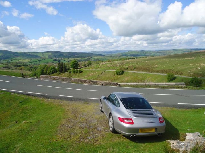 A car is parked on the side of the road - Pistonheads