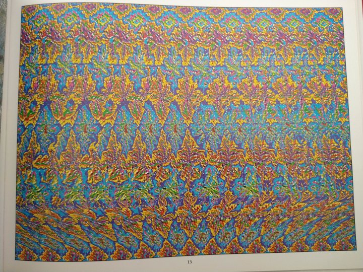 Magic eye pictures. Any good at 'em? - Page 14 - The Lounge - PistonHeads - The image displays a book with an open page. The open page features a cover with vibrant colors and abstract patterns, predominantly in shades of blue and green. The pattern on the book cover is intricate and dense, suggesting it might be a digital art or graphic design. The spine of the book shows that it is part of a series, but the specifics about the title, author, or publisher are not visible in the image. The style of the book appears to lean towards contemporary art or illustration.