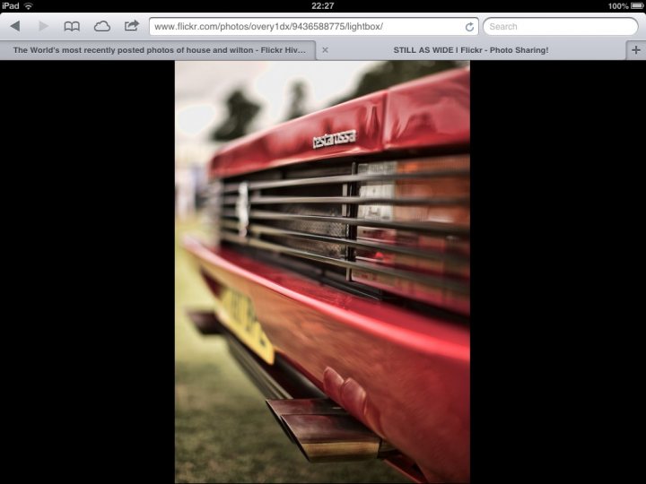 testarossa thread - Page 1 - Ferrari Classics - PistonHeads - The image showcases a red compact car with a license plate. The vehicle's front face is clearly visible, highlighting the car's design features. The license plate inscription reads 'EV 96'. In the top right corner of the photo, there are two distinct sizes of texts: the larger one reads 'THE WORLD'S MOST RECENTLY POSTED PHOTOS OF HOUSE AND VILTON ARE BRILLIANT', indicating the source or subject of the photo, and the smaller text says 'PLEASE DO NOT USE IMagine! Photo sharingt', which is likely a warning from the photographer about the use of the image. The overall image conveys a sense of casual, everyday photography capturing a moment of urban life or car culture.