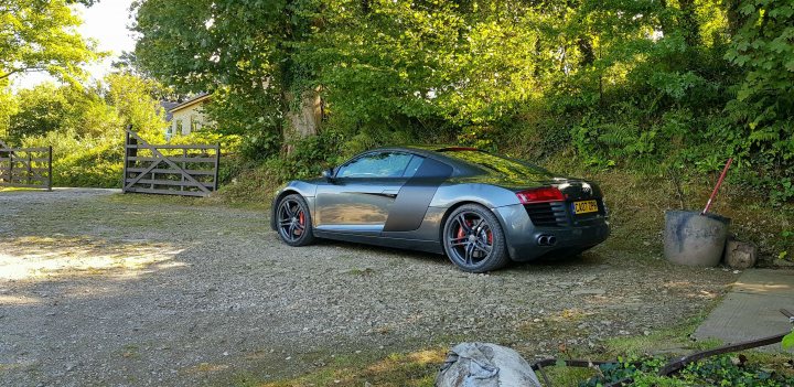 A car parked on the side of a road next to a fire hydrant - Pistonheads