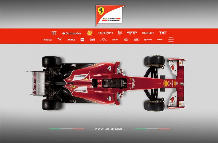 Ferrari F14 T Unveil - Page 5 - Formula 1 - PistonHeads - The image showcases a Ferrari Formula 1 car, viewed from a three-quarter perspective, showcasing its sleek design and prominently featuring the iconic Ferrari livery. The wings and arrows symbol, a defining characteristic of the Ferrari brand, is prominently displayed.