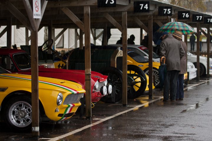 A group of people standing next to a train - Pistonheads