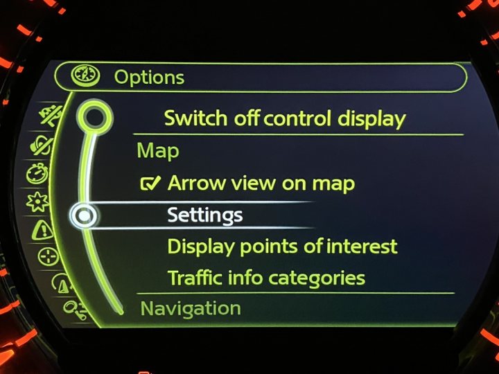 Is Mini sat nav the worst fitted to a modern car? - Page 1 - New MINIs - PistonHeads UK - The image shows a vehicle's dashboard displaying a navigation interface with options for settings, display modes, and control options. There is a large, central menu itemed "Display map." Below this, there are additional options such as "Display points of interest," "Navigation," "Traffic information," and "View on map arrow view on map arrow view on map." The style of the image suggests it may be from a driving simulator or a car with advanced navigation features.