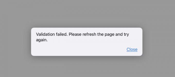 A close up of a street sign with a sky background - Pistonheads - The image displays a screenshot of an error message on what appears to be a webpage. The central focus is the error message itself, which reads "Validation failed" and includes a prompt that says "Please retry the page and try again." There's also a note that indicates an "Invalidation" occurred, suggesting that the user should reload the page in their browser for the issue to be resolved.

The background of the screenshot is blurred, but it seems to be a neutral-toned interface consistent with many website designs. The text and layout suggest that this message is meant to inform users about an unexpected technical issue and provide instructions for resolving it.