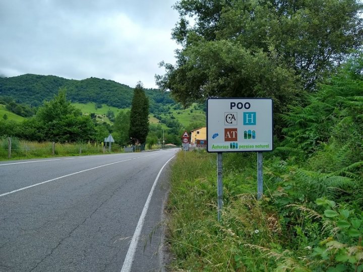 A street sign on the side of a road
