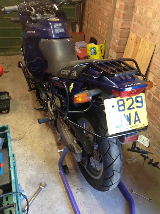 A motorcycle parked in front of a building