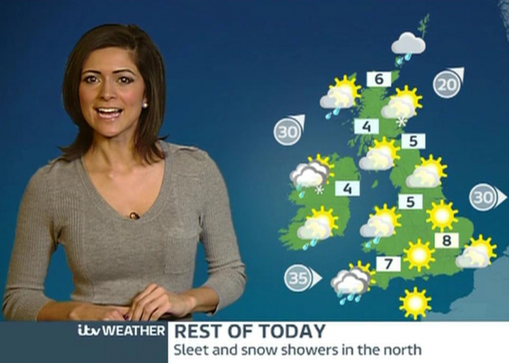 Weird Secret crush's from TV  - Page 19 - TV, Film & Radio - PistonHeads - The image features a woman standing against a background that showcases a weather map of the UK. She is dressed in a gray sweater and has short hair. The weather map is detailed, illustrating different weather conditions across the UK with color-coded icons. The text "REST OF TODAY" is visible, suggesting that the woman is providing a weather update or forecast for the rest of the day. The overall style of the image appears to be from a weather news segment.