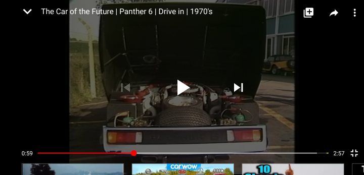 Who remembers this car of the future? - Page 1 - General Gassing - PistonHeads - The image is a screenshot from a video streaming platform displaying the interface of the website. It shows a video titled "The Car of the Future" from the channel "CAR FANATICS". The thumbnail of the video is visible, featuring a black truck with a camper shell on top. The video appears to be paused at a specific moment as evidenced by the progress bar and the time stamped 0:42. There are several user interface elements visible, such as the search bar, the home button, and other functional icons typical of video streaming platforms. The website's color scheme is predominantly white with black text and the video player has a light blue background.