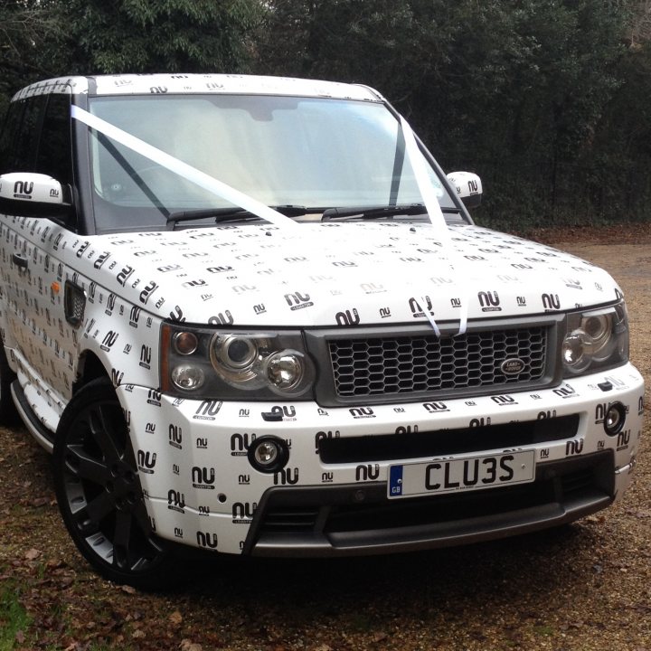 A white truck parked in a parking lot - Pistonheads