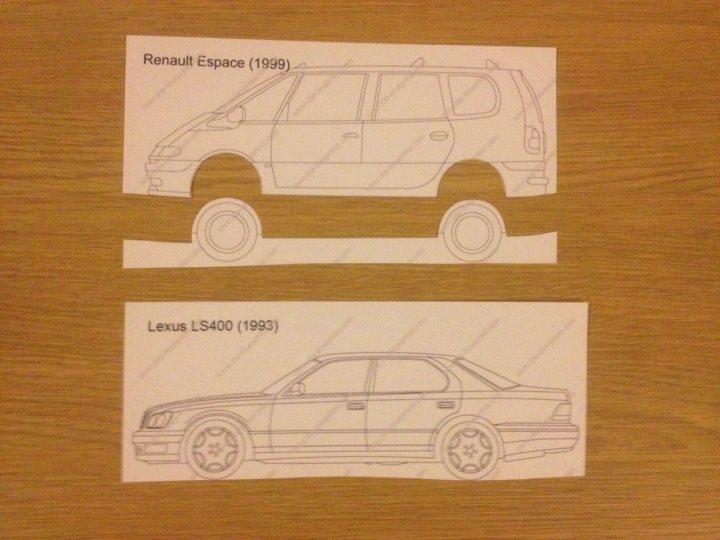 Lexus V8 with NOS in a Renault Espace - yeah lets do it !  - Page 56 - Readers' Cars - PistonHeads - The image showcases a sampling of Renault Espace models over two distinct years: 1999 and 1993. Two distinct cut-outs of cars are affixed to a wooden surface. The one positioned above appears to be a modern version of the Renault Espace, possibly from 1999. Conversely, the one beneath seems to represent an older model, possibly the Espace from 1993. The contrast in their design and structure offers a fascinating study of the evolution of automobiles over time.