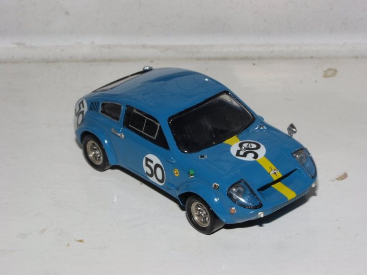 Collection Pistonheads - This image features a toy model car painted in a vibrant blue color with a striking number 50 on the side. The car is designed to resemble a racing or sports model, indicated by its aerodynamic features and solid, rounded wheels. The attention to detail in the paint and the number tag is quite realistic, giving it a charming and authentic look. The car is displayed on a plain background, which allows the blue color and the number 50 to stand out even more.