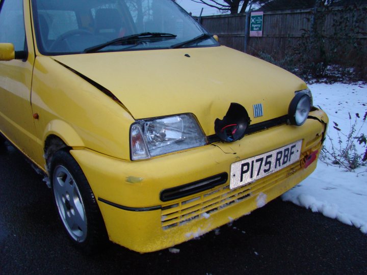 A yellow truck parked in a parking lot - Pistonheads