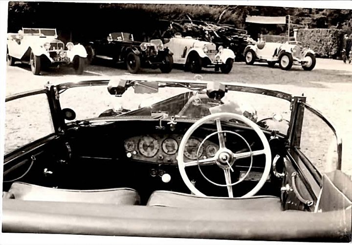 Classics Pistonheads Period - The image is a black and white photograph depicting two vintage cars from the early to mid 20th century. The left side of the photograph shows an overhead view of a vintage car with its top heelsed up, while the right side presents a side view of the same car parked next to a similarly styled car in profile. Both cars have classic designs with round headlights and body elements consistent with styles from the 1920s to 1940s.