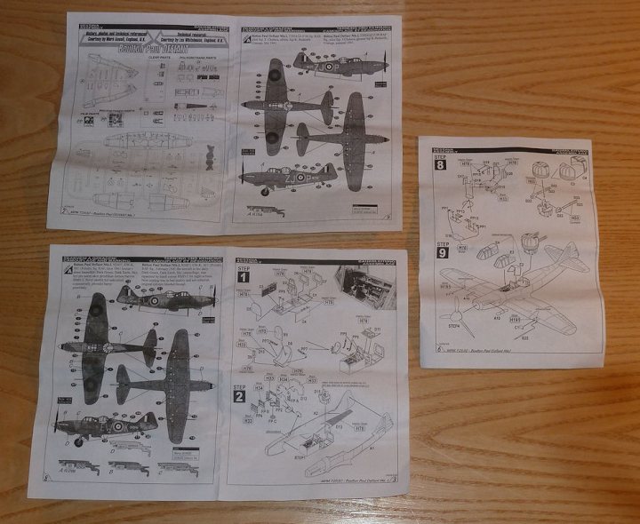 A collage of photos of a person holding a pair of scissors - Pistonheads - The image displays four sets of printed instructions that appear to be associated with building models of aircraft, specifically military planes. The instructions consist of detailed illustrations and diagrams, likely outlining the assembly process of building these models. The sheets are slightly crumpled, indicating they have been handled or used for the construction process.