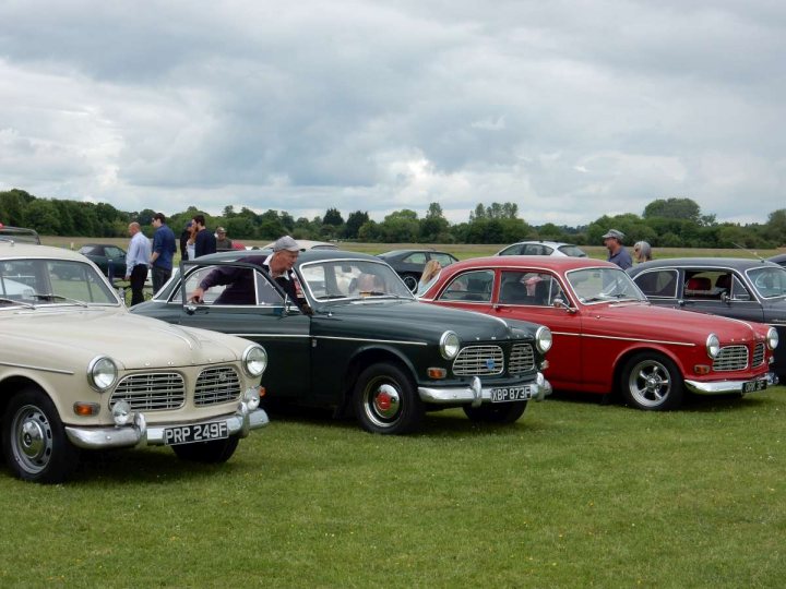 A classic car is parked on the grass - Pistonheads