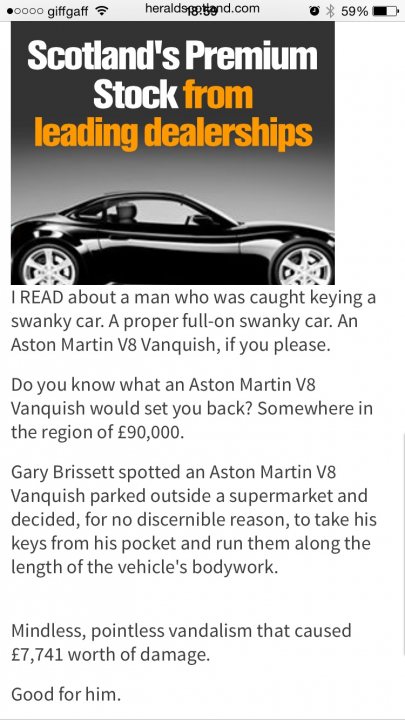 A black and white photo of a computer keyboard - Pistonheads - The image is a screenshot of an article from a website, with a title that reads "Scotland's Premium Stock from leading dealerships." The text above the title provides a humorous anecdote relating to a luxury car, specifically an Aston Martin, an offspring of a wolf and a swan car, suggesting humor and absurdity. The screenshot shows a base image of a sleek Aston Martin car, which is relevant to the text. The context of the article is not entirely clear from the provided section.