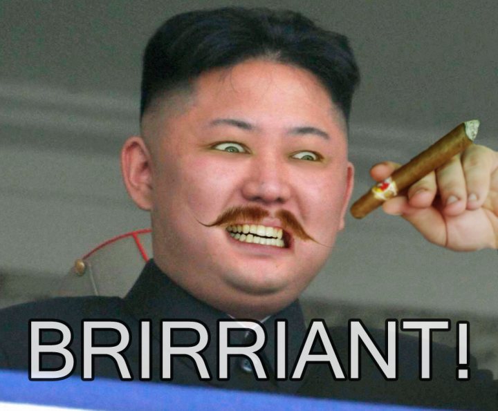 North Korea photoshop contest - Page 9 - The Lounge - PistonHeads - The image features a man with a playful expression, holding a cigar in his hand. His exaggerated facial expression contributes to a humorous effect. The word "BRIRRIANT" is overlaid across the image in bold, yellow lettering. The background is blurred but seems to be an exterior setting.