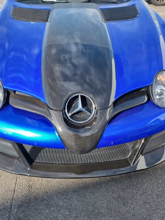 A close up of a blue and silver car - Pistonheads