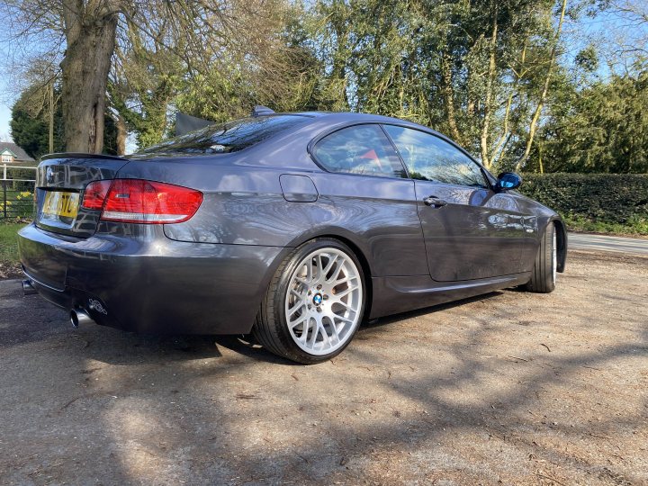 Pistonheads - The image shows a silver BMW car parked outdoors. The vehicle is positioned at an angle and appears to be in motion, as suggested by its dynamic positioning. The setting seems to be a sunny day given the lighting and shadows on the ground. There's no visible text or distinctive branding that can be discerned from this perspective.