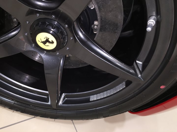 A close up of a black and silver motorcycle - Pistonheads