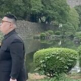Kim Jong Un spotted walking outside for the first time with his new pet