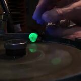 Cutting a gem called Hyalite Opal. The Uranium in this Opal causes it to Glow Green when exposed to UV light!