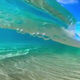 Smooth, slow motion rolling waves