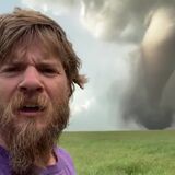 Stormchaser records tornado from across the road in Manitoba Canada