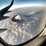 Rolling Clouds Around Mt Fuji From Plane