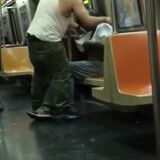 A man gave the shirt off his back to a homeless man on an NYC Subway
