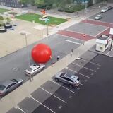 A giant red ball broke free from an art installation in Toledo